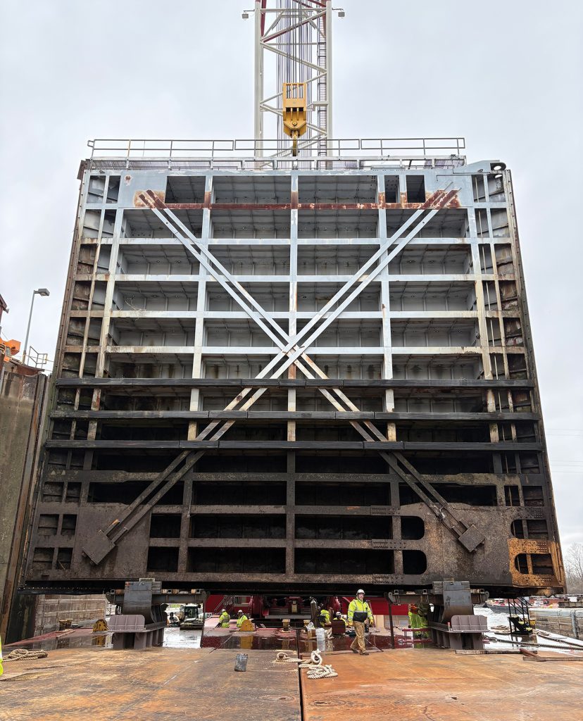 The lower left descending gate of the Lockport Lock on the Illinois Waterway is prepped to be laid down on a work barge. The chamber closed March 31. It is scheduled to reopen the evening of May 19 after replacement of gate pintle sockets.