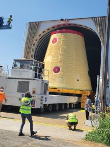 A rocket stage component is loaded onto NASA’s Pegasus barge in Iuka, Miss. (Photo courtesy of Canal Barge Company)