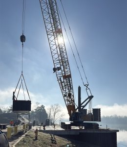 Nashville Marine Terminal’s 275-ton Liebherr 1250 crane lifts one of two 8-foot by 40-foot barges that were joined to create a landing dock for Nashville Riverboats’ two excursion vessels, the Capitol and the Nashville. The dock was a unique project cargo lift for the terminal, owned and operated by Parker Towing Company. (Photo courtesy of Parker Towing Company)