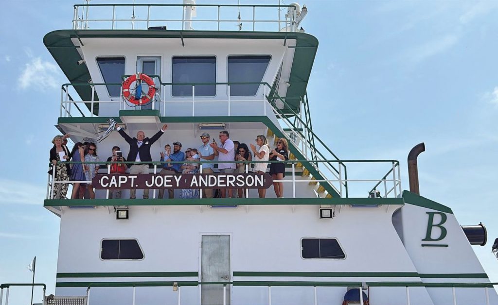 Capt. Joey Anderson and guests gather aboard the mv. Capt. Joey Anderson during the vessel’s official christening. Blessey Marine named the towboat in honor of Anderson’s 26 years of service with the company.