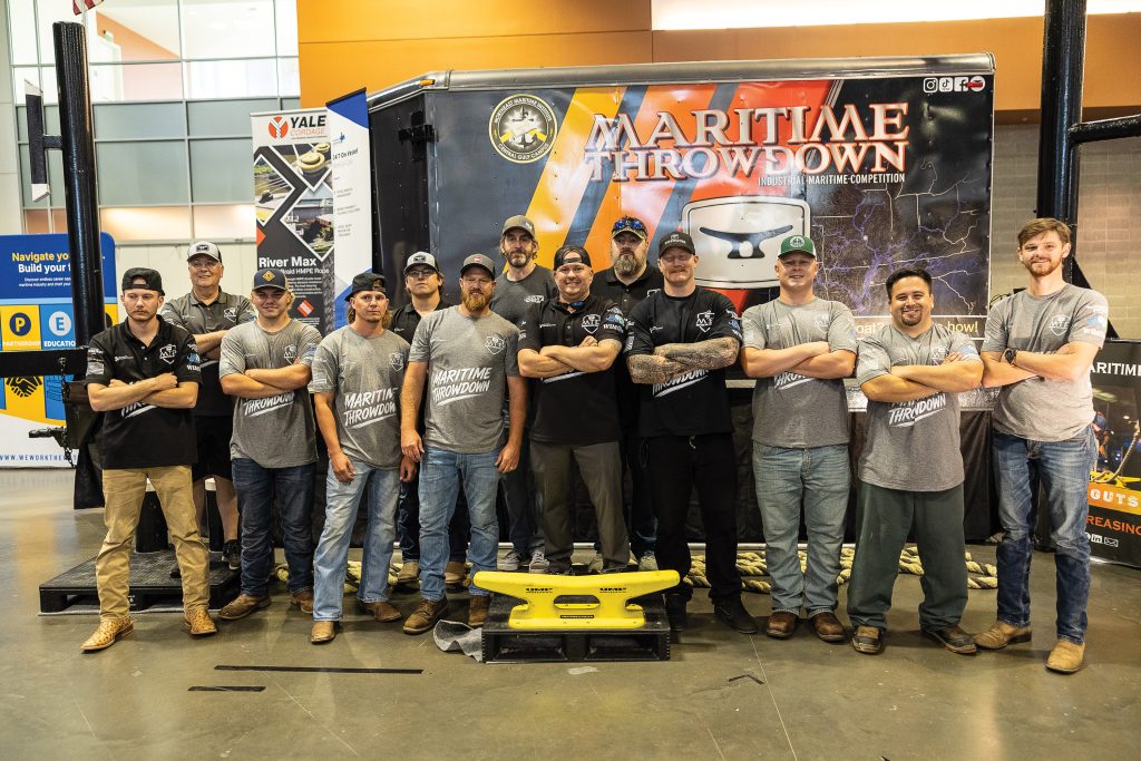Maritime Throwdown competitors and staff gather for a group photo during the 2026 Maritime Throwdown Finals, held in conjunction with the Inland Marine Expo (IMX) in Nashville, Tenn. The annual competition brought together mariners from across the industry to demonstrate professional line-handling techniques and other essential maritime skills before an audience of IMX attendees.