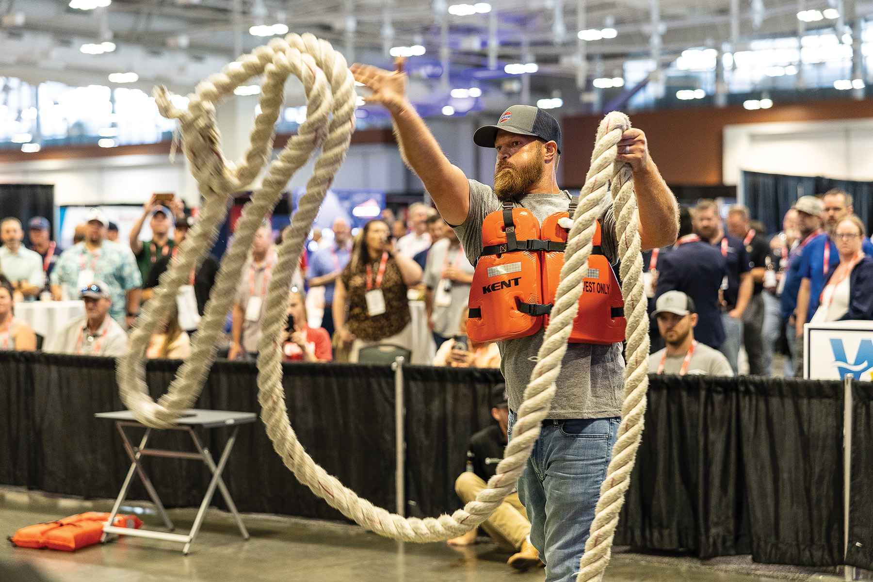 260615 MTD_4 Michael Kirk of Ingram Barge Company competes in a line-handling event during the Maritime Throwdown Finals at the Inland Marine Expo (IMX) in Nashville, Tenn. Kirk demonstrated his rope-handling skills as IMX attendees gathered around the competition arena to watch the action. (Photos courtesy of ECN Photography)