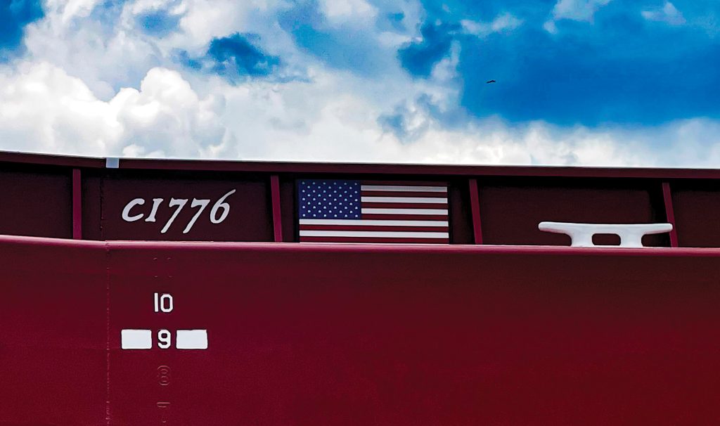Barge C1776 features an American flag and a stylized number indicative of the country’s founding with the signing of the Declaration of Independence in 1776.