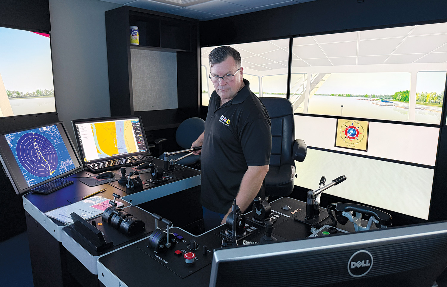 260720_SCI2 – Capt. Stephen Douglas Capt. Stephen Douglas pilots a new model for a simulated towboat through one of the simulators at the Seamen’s Church Institute’s Center for Maritime Education. The first model is expected to be ready for training in 60 to 90 days. (Photo courtesy of Seamen’s Church Institute)