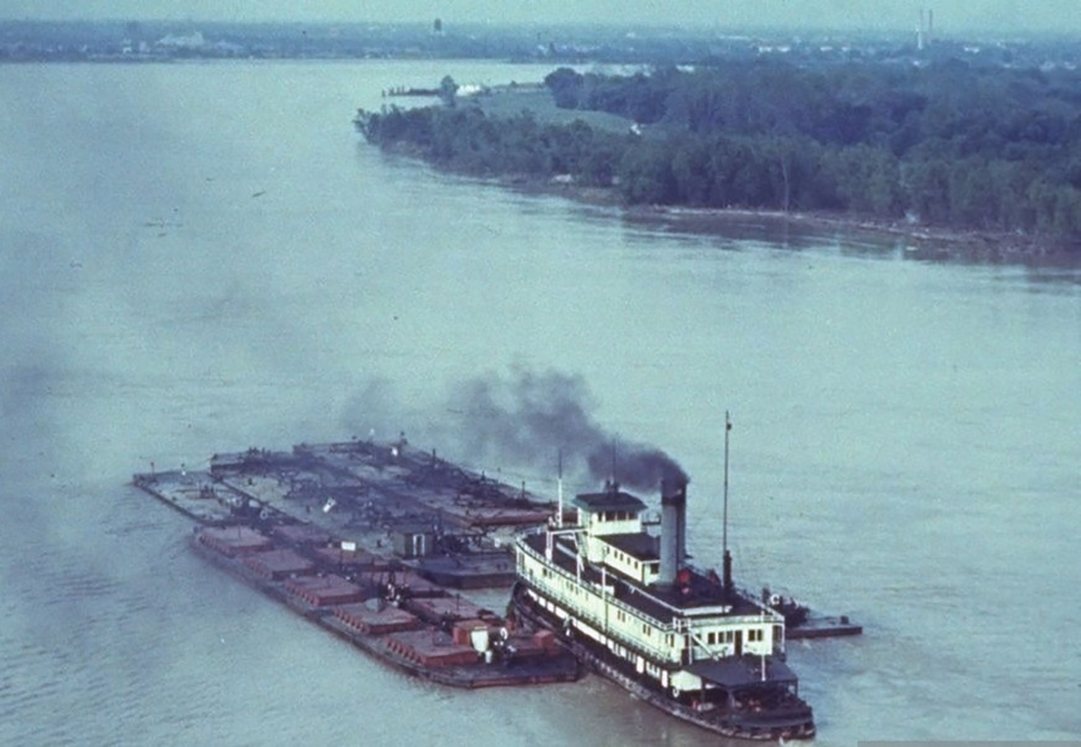 The McDougall underway with tow. (Photo from the author’s collection)