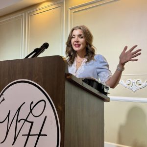 Lindsey Launius, executive director of the River Discovery Center in Paducah, Ky., expresses her excitement about the river museum’s many initiatives in a presentation to the Paducah Propeller Club on August 12.