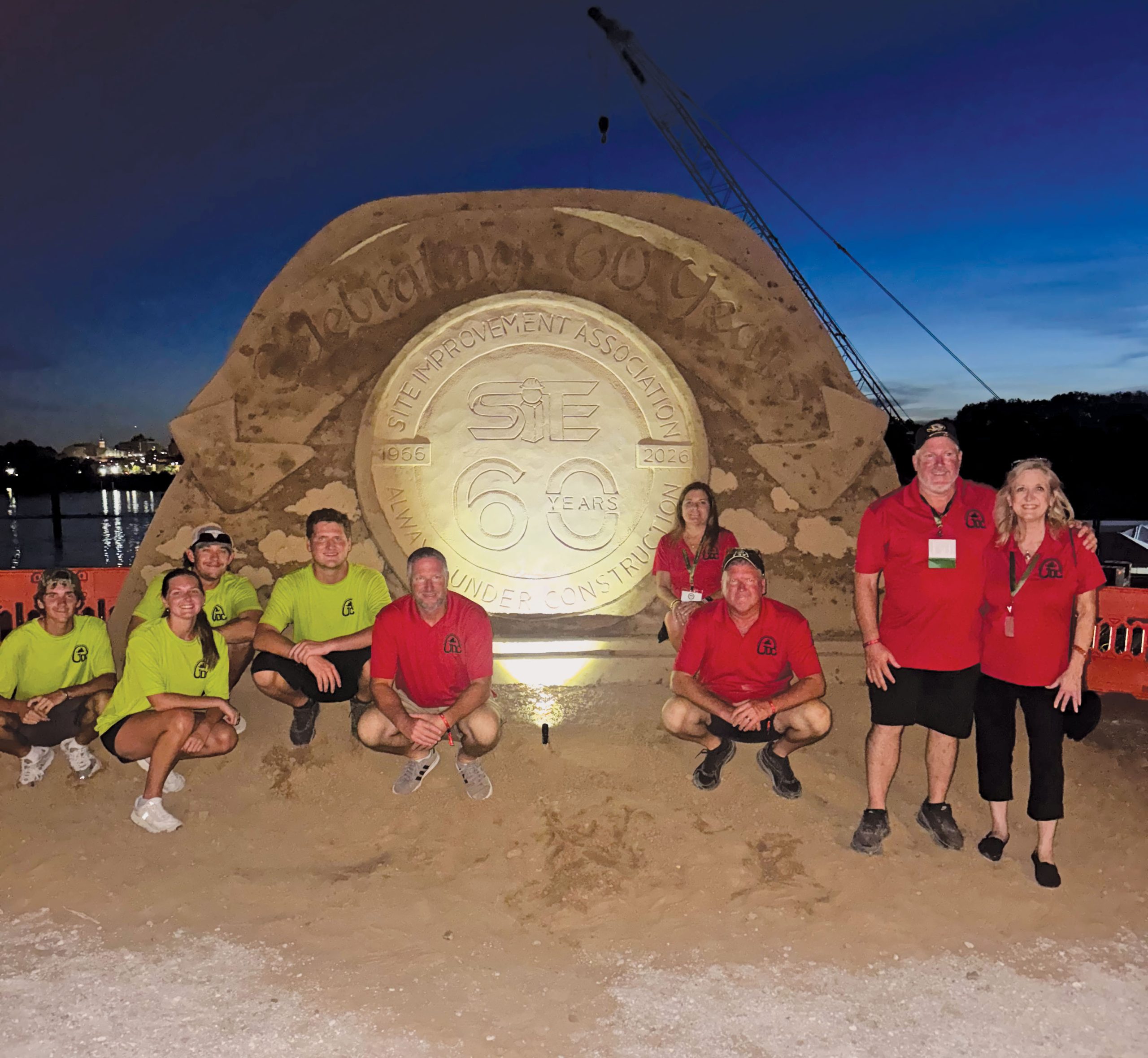 1000029760 A giant sand sculpture commemorated the 60th anniversary of the SITE Improvement Association.