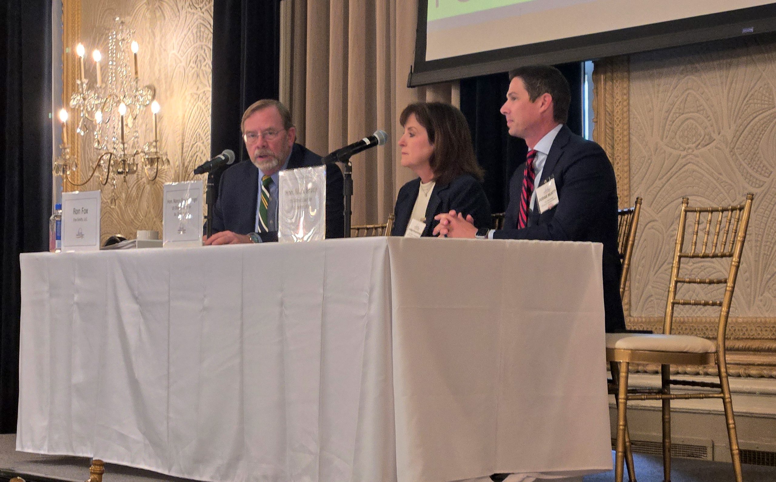 Fox Smith, LLC hosted the fifth annual Inland River Seminar September 22 at the Missouri Athletic Club. Panelists discussed a variety of topics related to maritime law, including the Rivers and Harbors Act and Jones Act compliance. Longtime lawyer Ron Fox (left) joined judges Nancy J. Rosenstengel and William Beatty for the third panel discussion, during which the panelists spoke about their perspectives from behind the bench. (Photo by Amelia Kingman) 