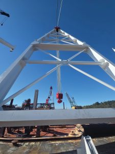 Big Rick’s steel framework rises above the barge deck. Okie Moore employees spent about two years building the A-frame between assignments, tailoring it to the company’s equipment and operating needs. (Photos courtesy of Wepfer Marine)