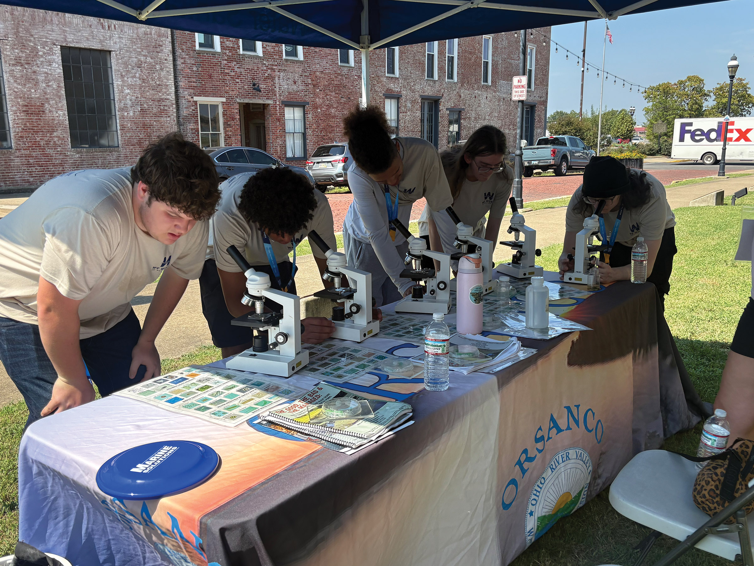 261019_WeWorkTheWaterways 2M Students examine water samples under microscopes during a We Work The Waterways Maritime Interaction Day, learning about the microscopic life found in the waterways. (Photos courtesy of We Work the Waterways)